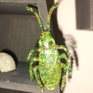 Glitter cockroach made from uv resin approximately 4 inches long